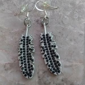3 for $15 Metal feather earrings.